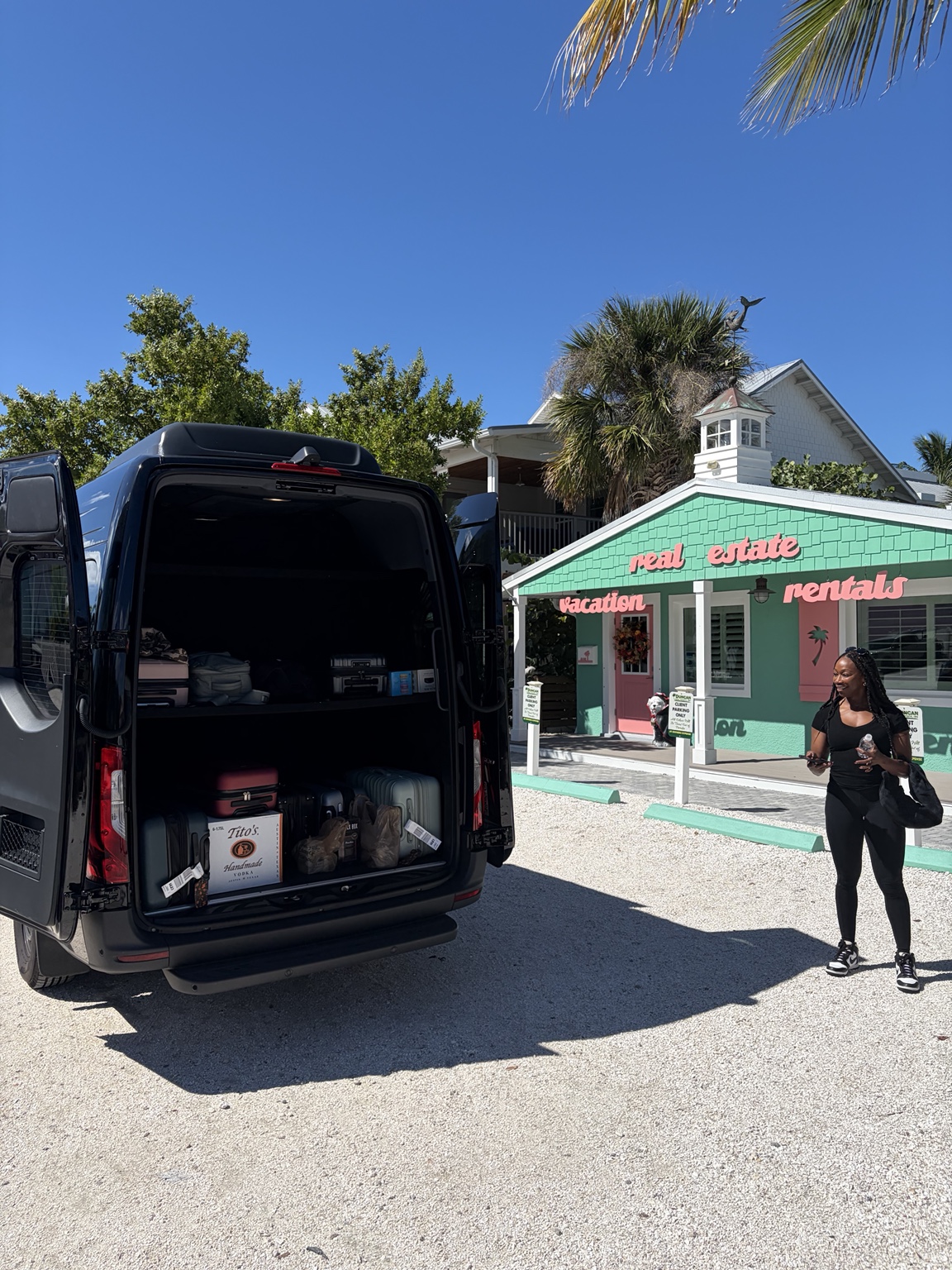 WDT Sprinter with luggage and a guest on Anna Maria Island