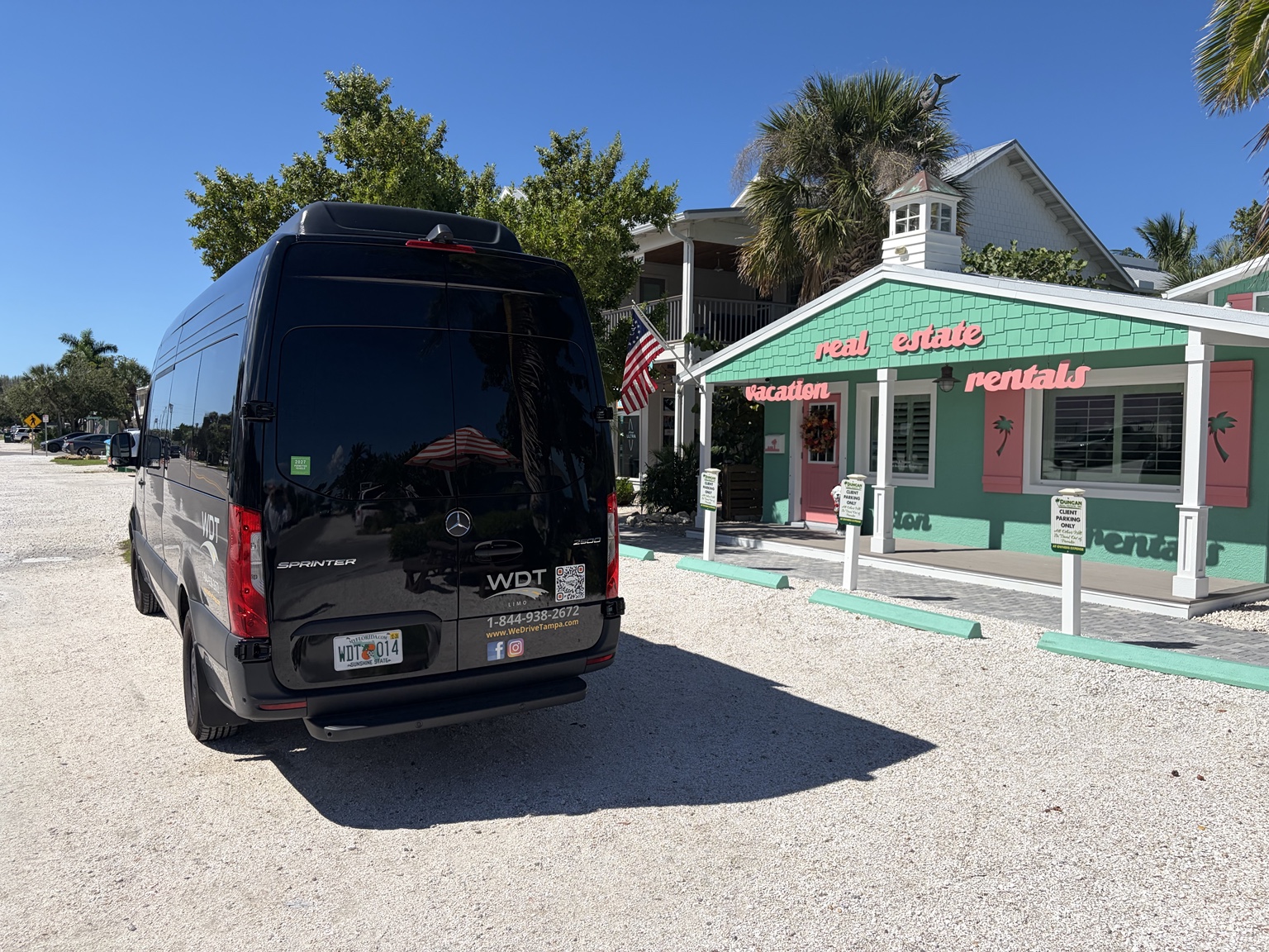 WDT Sprinter outside a colorful Anna Maria Island vacation rental office