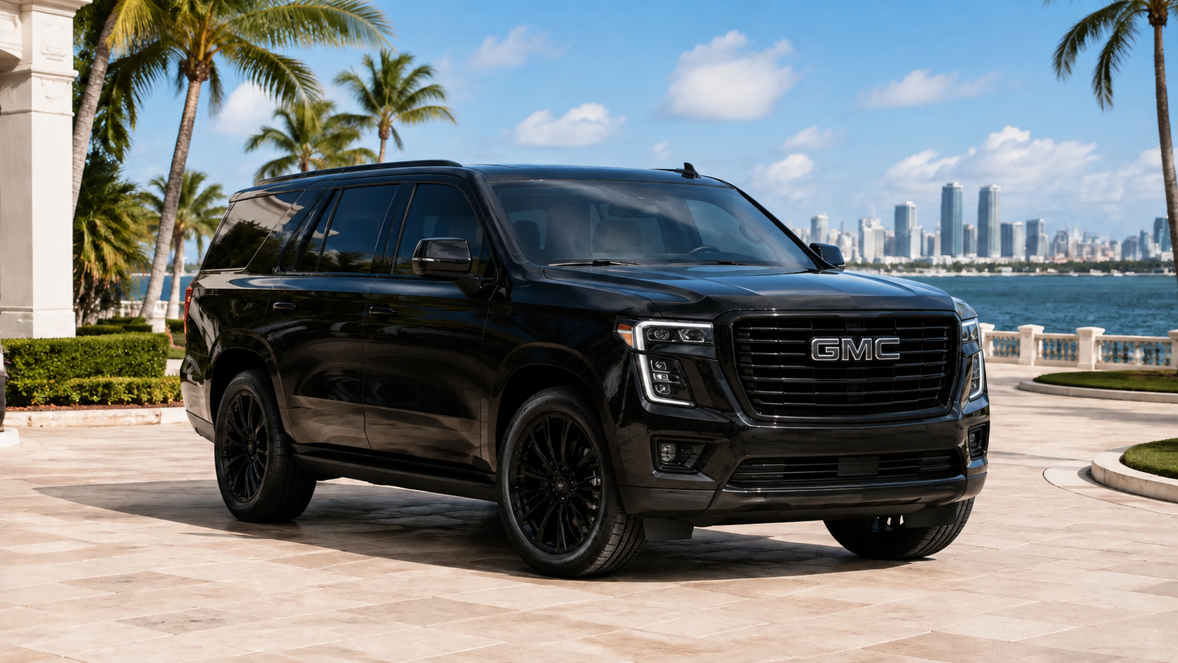 Black-on-black GMC Yukon with visible GMC grille badge for Tampa airport transportation